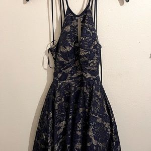 This is a size 0p dress from Camille la vie in a color navy blue and nude.